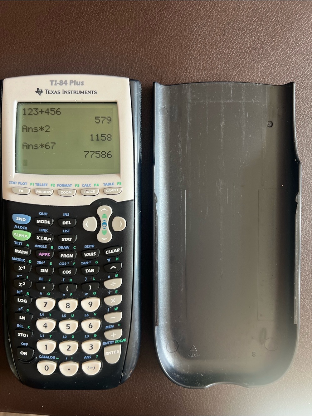 Texas Instruments TI-84 Plus Graphing Calculator in Black and White